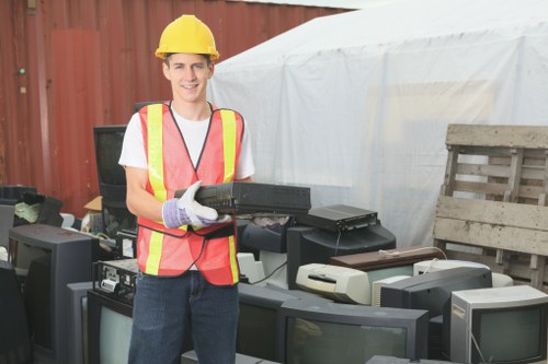 Different types of business waste including paper and electronics